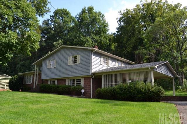 Spacious 3BR, 2.5BA tri-level home convenient to downtown Morganton and Morganton Aquatic Center. Low maintenance brick with vinyl trim home has hardwood floors and ceramic tile baths. Lower level features family room and laundry/storage. Updates within last 4 years include new roof, vinyl siding, A/C. Termite contract with Terminix. Property includes home and adjacent lot, both with Residential Low - Multi Family zoning.