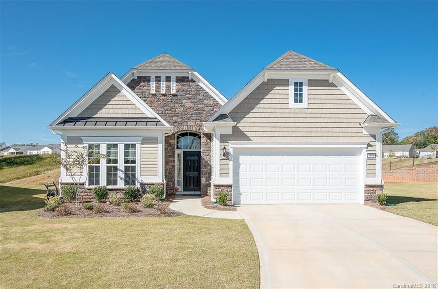 Priced to Sell! Privacy Lover's paradise. 1 year young, contemporary beauty on a cul-de-sac. Enjoy the privacy of this fenced backyard from the screened porch or patio on this huge .27 acre lot equipped irrigation system and custom landscaping. Gourmet Kitchen features island w/ breakfast bar, dining nook, desk niche, granite counters, tile backsplash, stainless appliances including wall oven & cook top gas range.  Superb move-in ready home. 55+ Active Adult Community.