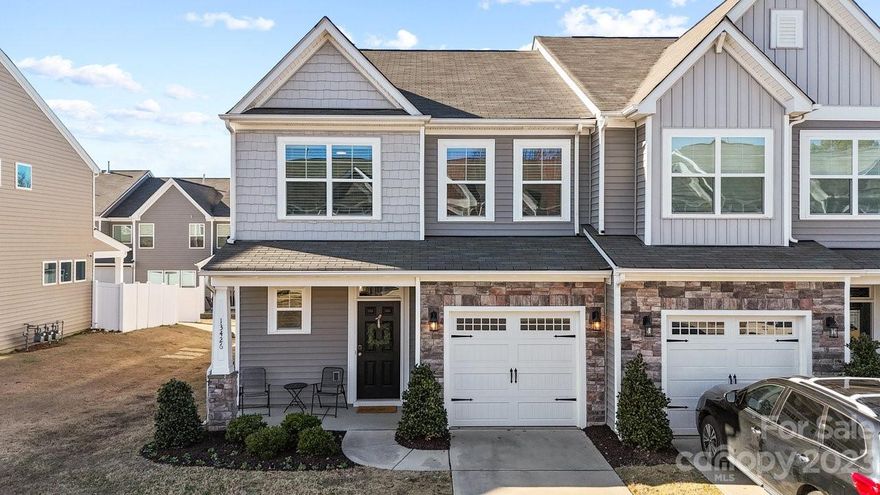 Beautiful end unit with extended driveway & upgrades throughout!  Foyer greets you with wainscot accent, and floating shelves built into nook, 2 wide coat/storage closets.  Chef's kitchen with 2 pendant island, 5 burner gas range, espresso cabinets with slide-outs, granite, pantry & lots of storage.  Open concept with spacious living room, transom windows in dining, sliding door opens to covered patio with extended grilling section.  Wood stairs with wood rails lead to large loft perfect for 2nd living space, playroom, or office.  Ample primary suite with additional closet storage, double vanity bathroom, oversized shower with wrap-around seat, linen closet.  Bedrooms 2 & 3 easily accommodate queen beds & additional furniture with plenty of space to move around.  Large hall bathroom has double vanity for ease of sharing.  Dual zone HVAC, keypad at front door and $2500 worth of CPI security equipment included ($50/m service).  Community pool & fitness, sidewalks throughout, walk to Lidl