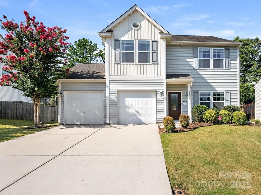 Welcome to this well kept low maintenance vinyl siding home!  This open floor plan boast hardwood floors and nine foot ceilings on the main level.  Very large kitchen with eat in breakfast or dinning area along with granite countertops, tile backsplash, soft white kitchen cabinets, and stainless steel appliances.  Large living room with built in electric fireplace with heater, surrounded by shiplap trim and lighted shelving.  Cute powder room with shiplap walls.  Office or flex space with shiplap wall on the main level.  New front door in 2025.  Upstairs features an open loft area, two good sized bedrooms and the primary suite with a tub/shower combo and a very large walk in closet.  Tile flooring in both bathrooms upstairs.  Convenient upstairs laundry room with shelving.  Backyard oasis with privacy fence, covered patio, fire pit, rubber mulched kid play area and a storage shed.  Oversized two car garage.  Security system.