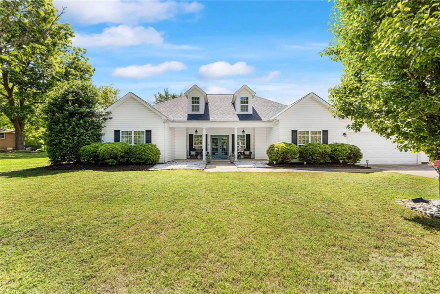 Precious 3BR/2BA house minutes from downtown Matthews! New 30-year architectural shingle roof (April 2025 w transferrable warranty). Newer LVP flooring in the living area (2022). You will feel at home from the welcoming covered front porch right inside to the light open floor plan. You'll love the split plan w the primary on the right & other bedrooms to the left. Good size rooms, spacious closets. Open kitchen w quartz countertops, tile backsplash, stainless appliances, an island & dining area. Awesome rear screened porch & stone patio (2022) where you’ll enjoy spending time – overlooking the huge fenced backyard w a firepit - so many options back here! There is also a 2-car garage, hard to find in this area for this price! All of this is just minutes to downtown Matthews, the farmers market, theater, restaurants & so much more! Squirrel Lake Park is one street down and a Four Mile Creek greenway access is right at the end of the street! The location can’t be beat. Come see it today.