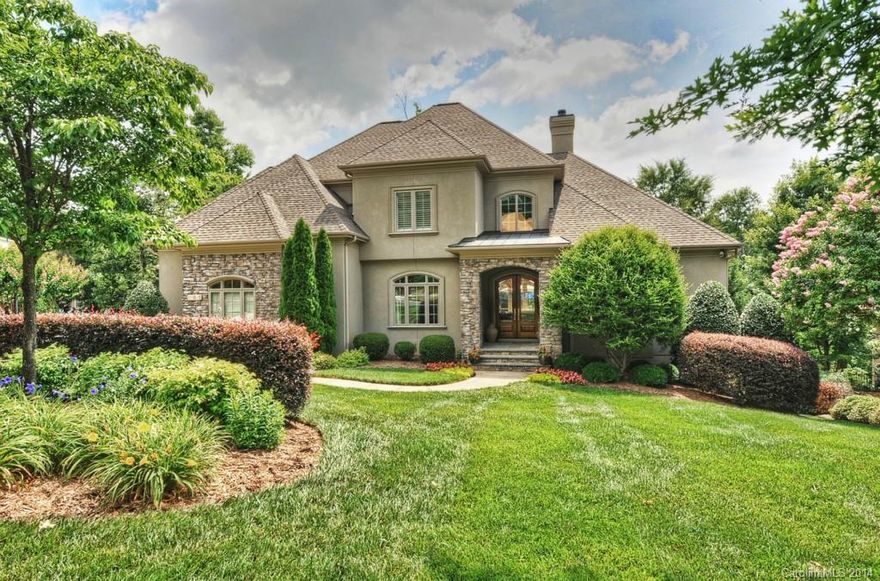 READY FOR CUSTOM & ELEGANT! READY FOR RESORT LIVING!--Tour the "Best of Ballantyne" w/attention to details inside & out! Chef's kitchen w/ Viking commercial appliances,  granite, cabinetry by "Brookhaven". Main Master w/ elegant Marble Bath,2 WIC & Sitting. UPPER- Oversized Secondary Bedrooms  w/private Baths, Home Office PLUS Bonus. LOWER- MEDIA, BILLIARD, WET BAR, Rec Rm w/FP, Pool Bath & Changing & Private Guest. Expansive Summer porches overlook Pool & Spa-- ELEGANT, UNIQUE & PRISTINE!