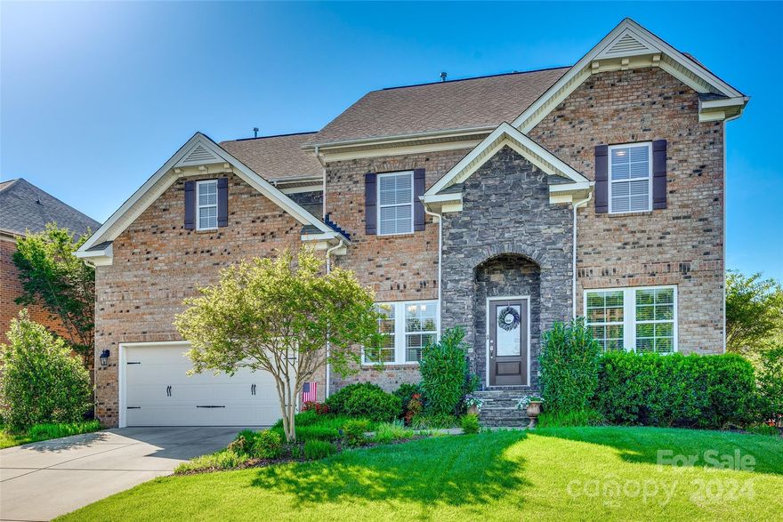Welcome home in desirable Tega Cay! This full brick 5-bed, 3-bath home offers a blend of elegance and functionality. Work from home in the dedicated office space with built-in bookshelves, then unwind in the spacious kitchen featuring stainless steel appliances, Quartz countertops, and ample cabinet space. Relax in the gorgeous screened-in porch and patio area within the fenced backyard, perfect for outdoor gatherings. Upstairs, a large loft provides additional living space, while the spacious primary suite boasts 2 walk-in closets. Tega Cay is renowned for its top-rated schools and vibrant community atmosphere. Don't miss out on the opportunity to make this your forever home!