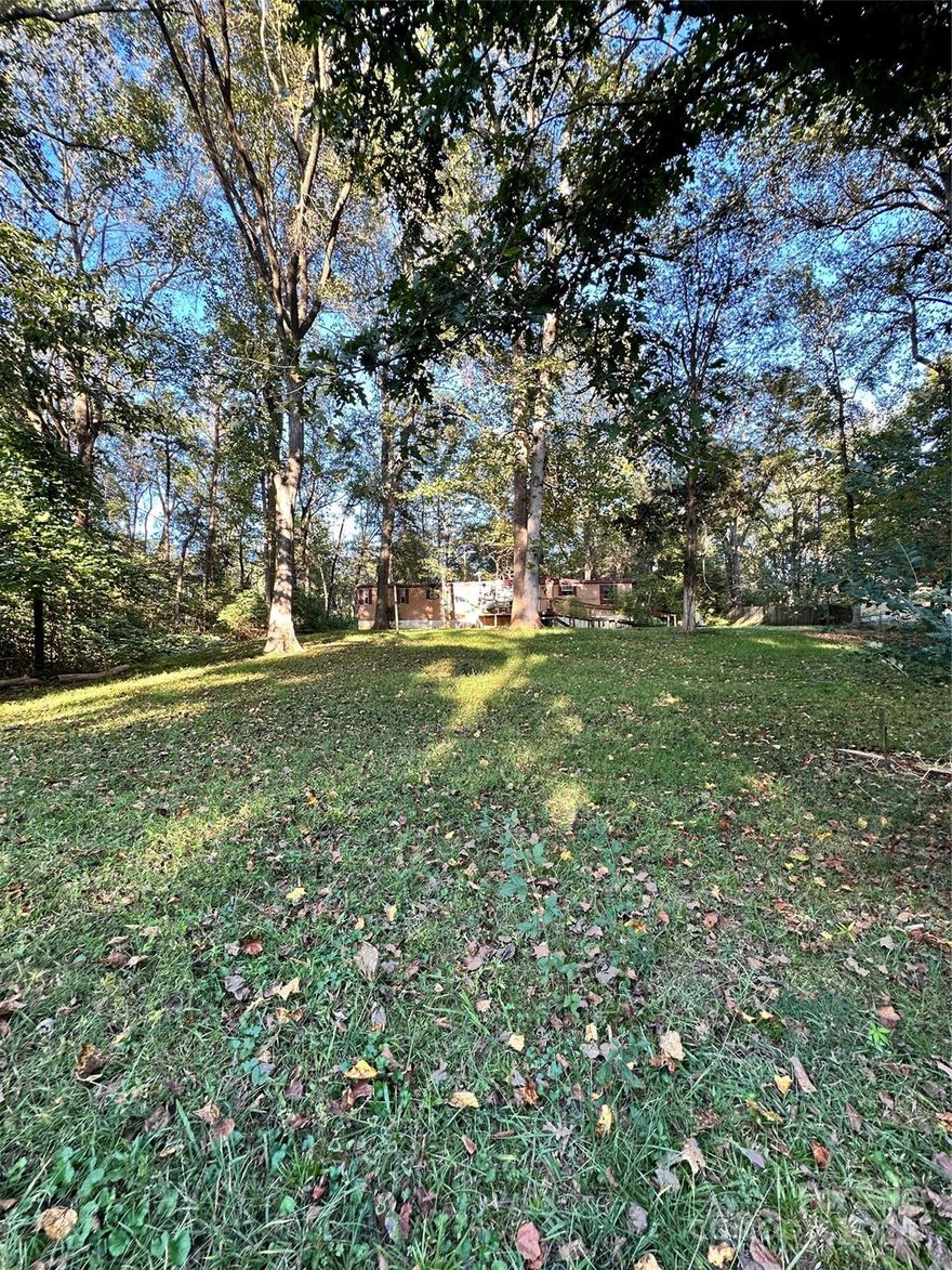 Looking for land with potential? This 0.67-acre property in York County, SC offers space, privacy and endless opportunity. The 1-bedroom, 1-bath mobile home currently on site needs full renovation and is being sold As-Is, making it ideal for a cash buyer or investor ready to build equity.

With room for a garden, small livestock or outdoor recreation, the setting is well-suited for homesteading, hunting or creating your own rural retreat. Surrounded by established homes and mature trees, the lot provides a peaceful backdrop and plenty of flexibility for your next project. Whether you envision a new manufactured home, an investment property or your next homesite, the possibilities here are wide open

Conveniently located off Filbert Highway, near Larne Elementary and just minutes from downtown York, this property combines country charm with quick access to everyday needs. The value is in the land, so bring your vision and make it yours today!