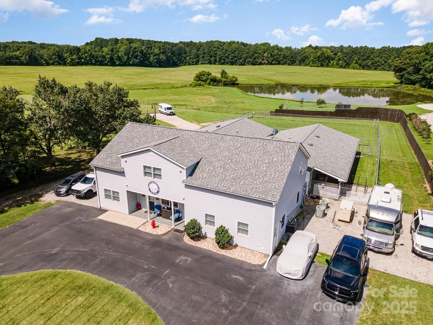 This thriving property offers a unique blend of a profitable dog boarding & training business, equestrian facilities, & rental income—all on 7+ acres of expansion-ready land! The established dog business comes w/ a 5,000+ customer database, providing immediate cash flow & growth potential, while the neighboring kennel generates over $500K annually, proving strong market demand. The versatile setup includes a 3-stall barn, a 2-BR apartment, & a 1-BR accommodation above the barn, ensuring multiple revenue streams. Henderson’s booming 17% annual income & population growth make this a prime location for scaling the business—whether by expanding the kennel, adding equestrian services, or developing the land. The property is ideal for an owner-operator seeking a turnkey business or an investor looking for a high-yield asset w/ appreciation potential. With low competition, high demand, & room to grow, this is a rare chance to own a cash-flowing business in one of NC’s fastest-growing markets!
