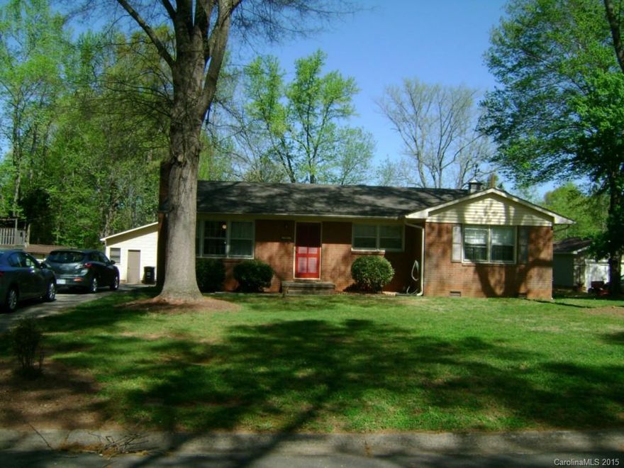 Enjoy this all-brick home on a shady tree-lined street.   App. 1200 sq ft home in quiet, family oriented neighborhood.   App. 800 sq ft detached garage/workshop with office.  Masonry fireplace, hardwood floors in living and bedrooms.  LR, DR, Kitchen, 3 Bdrms, 1 bath.