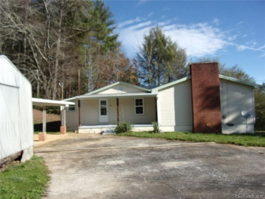 New electrical, plumbing, windows (except 2), heating system, appliances, and morel On .74+/- acres with mountain views.