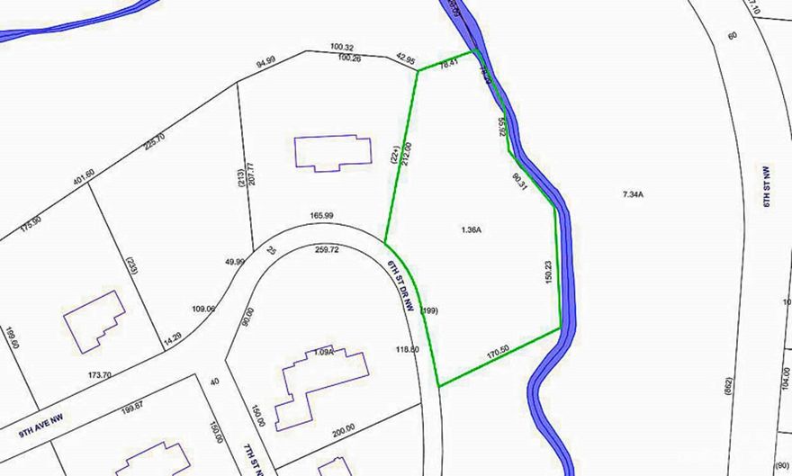 Great opportunity to own a 1.36 acre lot in NW Hickory near "THE PINES" off of 6th Street NW.  Close to downtown for shopping, restaurants, and more!  Wooded lot with creek on backside (some floodplain).  Current City of Hickory water line does not run all the way to the property. Stops at neighboring home (to the left)- City of Hickory Sewer line is on back side of property running. See photo of map for lines--Blue line is WATER and Green line is SEWER . Restrictions in Assoc. Docs. Minimum build not less than 2000 sqft on the principle floor,  etc--SEE RESTRICTIONS for exact details. Buyer will want to ask closing attorney to search further. Call City of Hickory Planning/Cat. County with any questions about setbacks, etc.