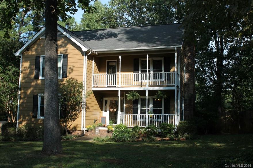 2 story home in well established neighborhood. Master on main floor. Large bedrooms, bright open kitchen, dining room with bay window, beautiful laminate floors. Brick gas fireplace in great room. Balcony off 2nd floor. Awesome back yard with brick paver patio, separate fenced area for dogs, storage building and covered porch. There is tons of storage in this house including a huge walk in attic.