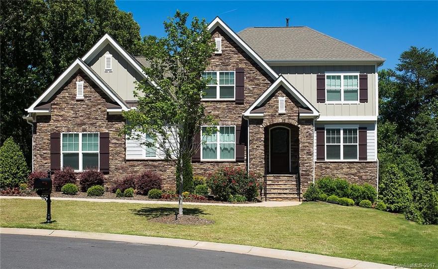 Beautiful luxury home with outdoor oasis in desired Fort Mill community!  This remarkable home sits on a cul-de-sac lot with a private fenced-in yard, in-ground pool, hot tub, outdoor bar, and the list goes on. Bright open floor plan offers master on main, mud-room with custom built-ins, butler's pantry, hardwood floors, custom lighting, tile, paint, tankless water heater and more. Salt water pool added in 2016 with gunite and travertine. Easy access to I-77, fantastic schools and low taxes.