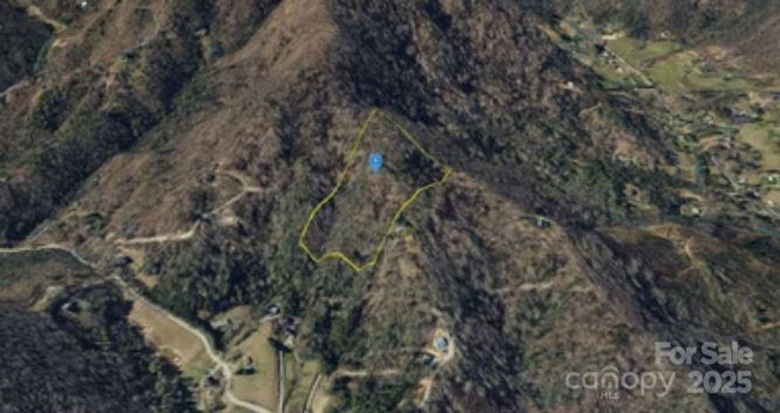 Located off Bob Barnwell Rd, this OU-zoned property offers ultimate flexibility with no HOA or deed restrictions. Subdividable with a 1.5-acre lot minimum, it’s perfect for building or investment. Well and septic needed; electricity is available at the street. 

Just 10 minutes to Cane Creek Pool and only 20 minutes to Asheville—home to endless amenities, shopping, parks, golf, the NC Zoo, Blue Ridge Parkway, Asheville Botanical Gardens, Lake Julian Park with boat access and many more. A rare opportunity for space and convenience!