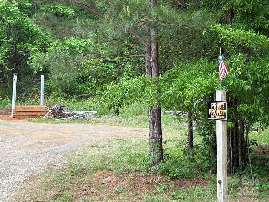 Private and secluded best describe this off the beaten path 1.28 acres. Low county taxes, no restrictions, modular, manufactured homes allowed. Minutes to Mooresville yet quiet and country-like.