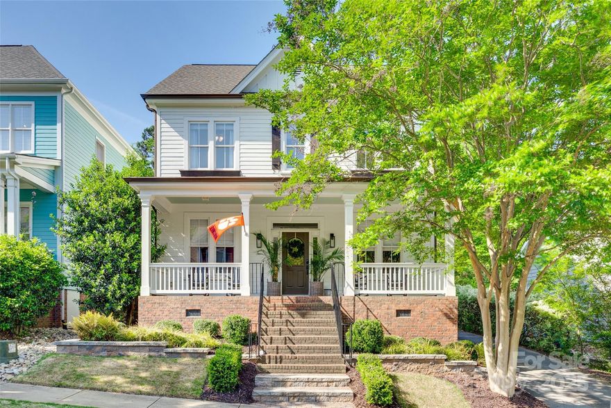 This Baxter Village beauty at a new price is ready to welcome you home! Prepare to be wowed by the renovated main floor featuring a gourmet kitchen set to impress any chef—high-end WOLF gas range, custom cabinetry, quartzite countertops, large island, walk-in butlers pantry. The open kitchen flows seamlessly into the breakfast nook & cozy living room, a perfect gathering space. The primary suite has dual closets & ensuite bath, complete w/dual vanities, a large tub, & separate shower. Add'l features include a dedicated home office, sitting room w/custom built-ins, guest suite w/full bathroom, spacious laundry room w/marble counters, bonus room w/endless possibilities & walk-in storage, mud room, & screened porch w/storage below. New carpeting in all 5 beds & closets! Long driveway & attached garage provide plenty of parking. Prime location, easy access to the Community Center, pools, playgrounds, tennis courts, walking trails & all that Baxter has to offer, easy commute to Charlotte.