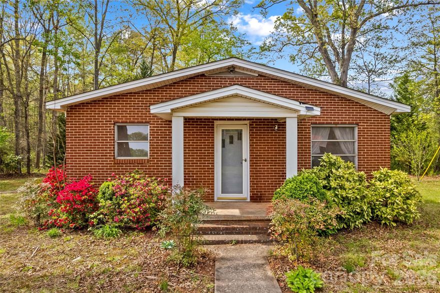 Charming 2 bed, 1 bath home presents a wonderful opportunity for homeowners or anyone looking to enjoy a peaceful setting with room to grow. The property offers ample outdoor space for gardening, entertaining, or future expansion.

Inside, the home features a cozy and functional layout designed for comfortable everyday living. The classic brick exterior adds timeless appeal, while the interior offers a warm and inviting atmosphere ready for your personal touch. Whether you’re looking to move right in or update over time, this property provides a solid foundation to create your vision.

Additional features include a detached 2-car carport, providing convenient covered parking and extra storage options. The porch area offers a great spot to relax and enjoy the surrounding natural setting, whether it’s your morning coffee or winding down in the evening.

With its established surroundings and generous lot size, this property delivers a rare combination of charm, space, and opportunity. Perfect for a quiet retreat while still being within reach of nearby conveniences, this home is full of potential and ready for its next chapter. Don’t miss your chance to make it yours!