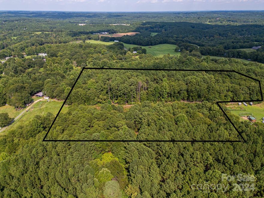 8.4 Acres situated in a private, rural setting. Mooresboro, NC is centrally located between Charlotte and Asheville. Beautiful Blue Ridge Mountains nearby in this quiet community. Built a custom home and enjoy the natural setting surrounding the land. Septic and well required.