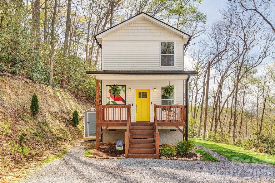 Sited on a quiet and wooded Fairview knoll, this like-new 2024 home has been thoughtfully updated with so many bells and whistles! The open floor plan has room for the entire family to relax. The kitchen boasts granite countertops, an expansive island, under-cabinet lighting, and soft-close cabinetry. Spacious bedrooms feel treehouse-like, with views of mountain ridgelines and mature greenery. Enjoy nearby hiking, shopping, or dining. Or, stay home and relax with a book by the babbling waterfall, plant a garden, sit by the firepit with loved ones, or finally have those chickens you've been wishing for (coop conveys)! Enjoy mountain breezes, birdsong, and star-filled skies from your wrap-around deck. Located just 20 mins to downtown AVL or The Biltmore Estate, the location is perfect for a second home or STR. Furniture/Personal property available with sale to make this property truly turn-key. Ask for list of over 50K in seller updates, including paved driveway, slider to deck, fruit trees, blueberry bushes, and more!