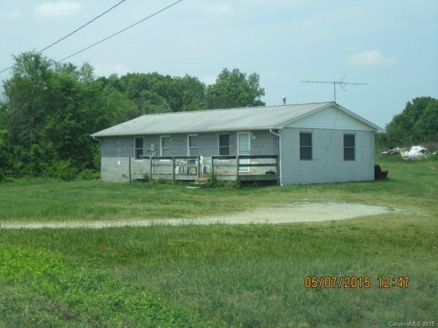 Concrete block, open plan.  Some remodeling has been completed.   Property is being sold as is.  Bank of America, N.A., employees and employees' household members (including persons deriving their primary means of financial support from a bank employee) and HTS business partners of the bank are prohibited from purchasing this property, whether directly or indirectly.