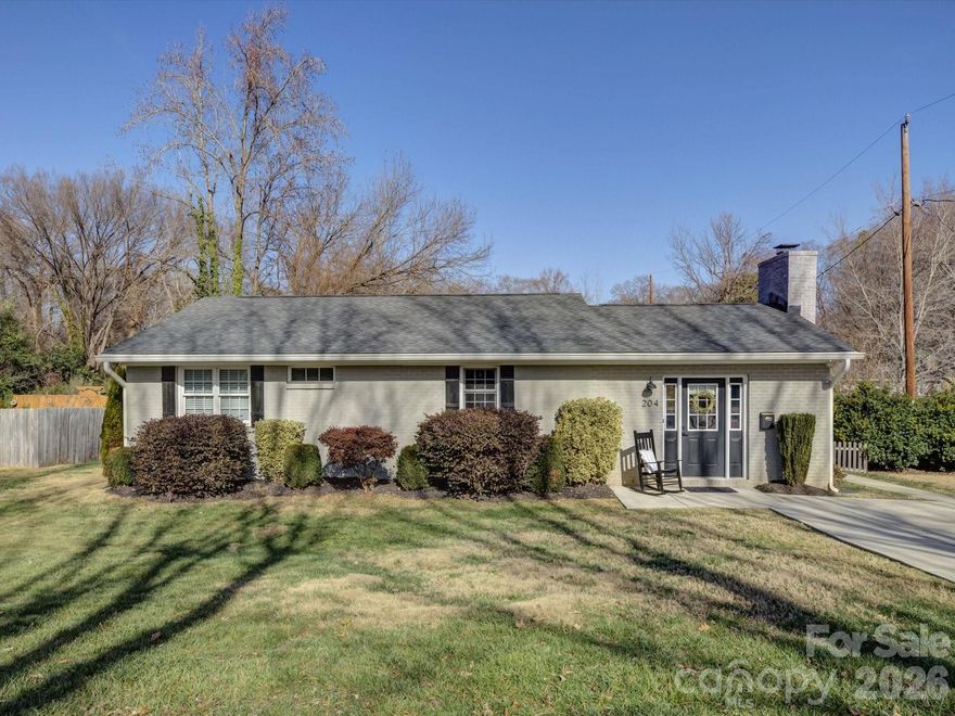 Location, Location! Renovated Ranch in the Heart of Fort Mill

Welcome to this beautifully updated 3-bedroom, 2-bathroom ranch home nestled in the vibrant heart of downtown Fort Mill. This charming residence blends timeless character with modern upgrades, featuring hardwood floors and detailed millwork throughout. 

Enter into the spacious gathering room, where a cozy fireplace sets the scene for relaxing evenings and entertaining guests. The beautifully appointed kitchen is a chef’s dream, boasting a large center island, stainless steel appliances, and granite countertops — perfect for both everyday living and hosting. 

Enjoy added convenience with a spacious laundry room and a large, partially fenced-in yard, ideal for outdoor fun, gardening, or simply soaking up the Carolina sunshine. 

Just minutes away from Walter Elisha Park, you'll have easy access to scenic walking trails, the outdoor amphitheater, and all the charm that downtown Fort Mill has to offer — from local restaurants and boutiques to community events. 

Don’t miss your chance to own a move-in-ready gem in one of Fort Mill’s most sought-after locations!
