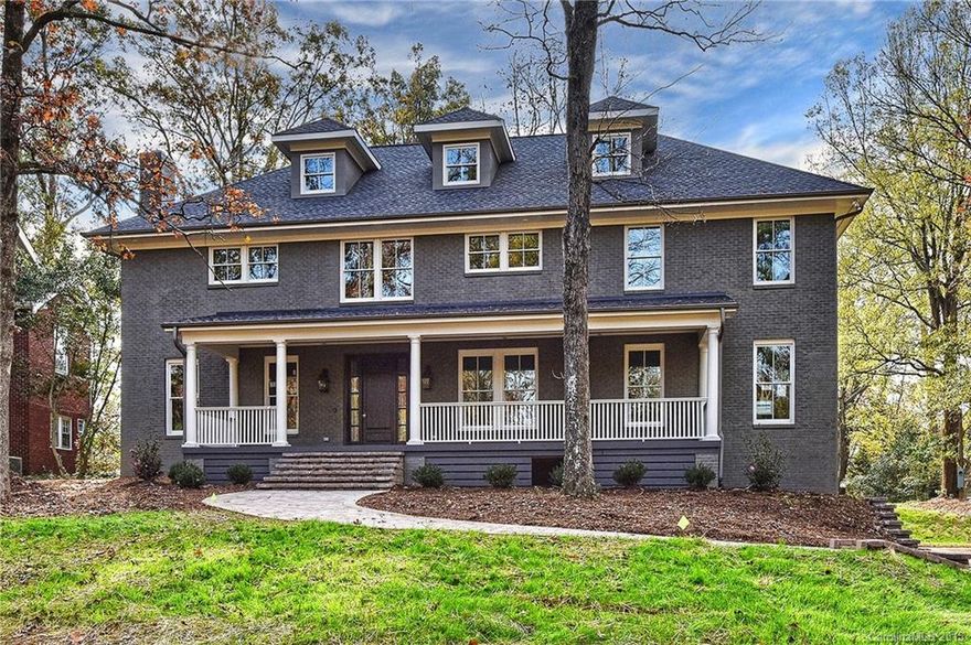 Gracious living in this stunning renovation on an exquisite .74 acre lot close to Charlotte Country Club. Understated elegance, versatile floorplan, great flow, custom features & tremendous attention to detail make this home feel just right. Master retreat w/ private sunroom, huge closet & soaking tub. Large bedrooms, 3 living spaces, front and rear covered porches. Thermador Professional appliances, custom cabinetry, steel mantel & surround, marble bathrooms, large yard and the list goes on.