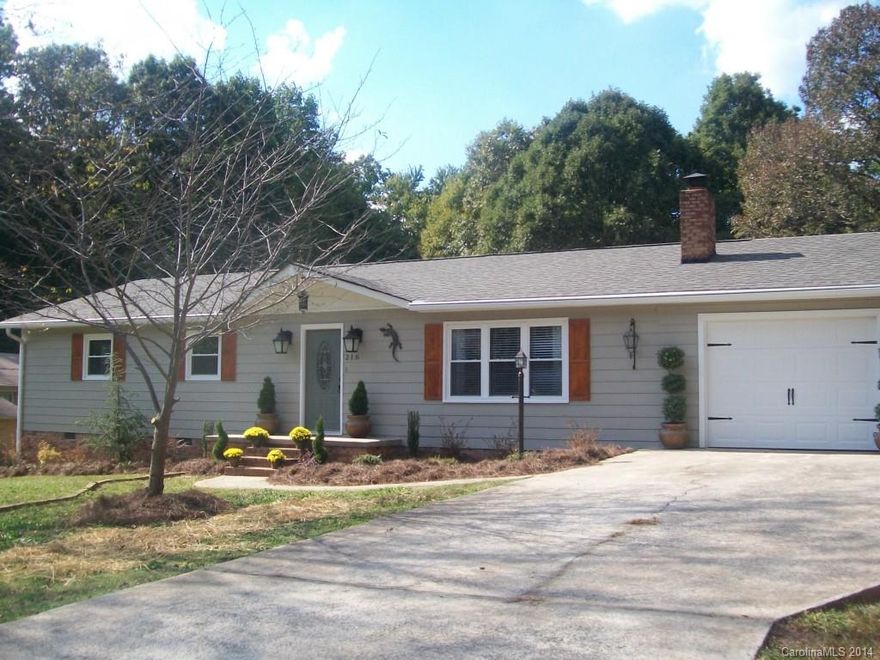 Completely updated home in a desirable area!  Nice Home with Granite Counter tops in Kitchen and in Both Baths.  Home Features a new HVAC, new roof, freshly painted and solid Hardwood Bamboo Flooring throughout.  Upgraded fixtures.  Large eat in Kitchen with Granite bar and breakfast area and Stainless steel appliances.  Custom wood exterior shutters. Updated plumbing. Professionally Landscaped. Large deck for entertaining.   Back yard is fenced in.  This is a must see too many upgrades to list!