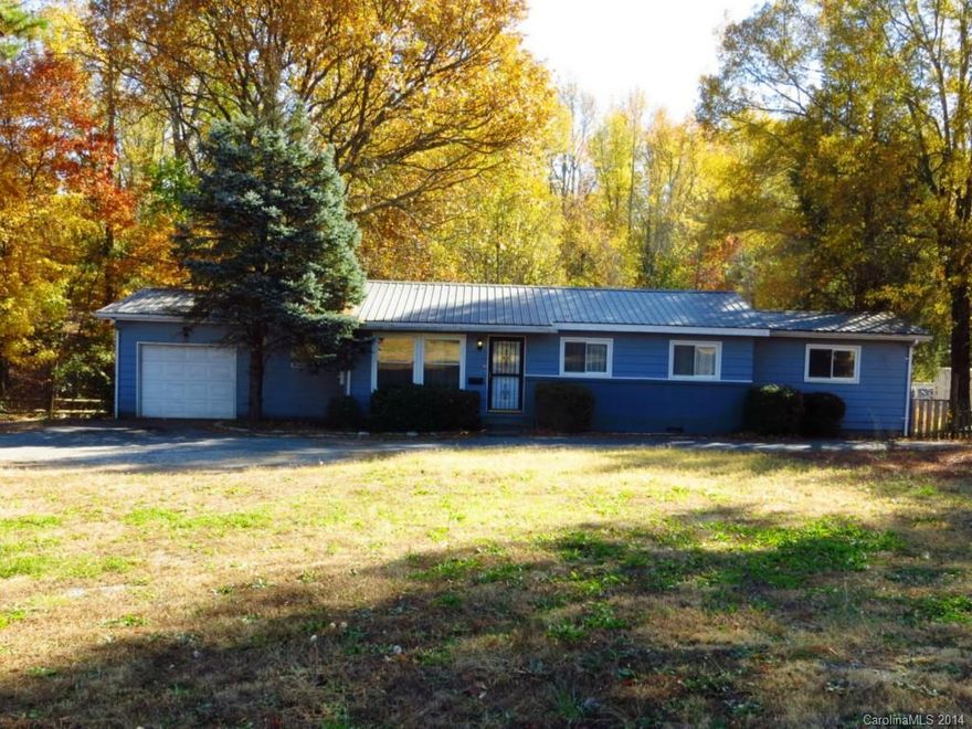 This property is zoned commercial and the house has been used as residential/office.  Property can be leased for commercial with additional property available.  The additional property can be used for storage of boats, campers, etc. for additional monthly rent.  The house has a one car garage/workshop and a large storage building, plus fenced backyard.