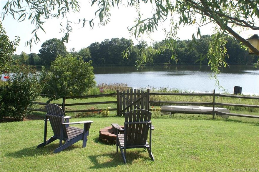 WATERFRONT HOME in Hamilton Lakes. This is a rare find-FOUR bedrooms with 2.5 baths.  Beautiful distressed Hickory hardwood floors in family room. Resurfaced concrete floors in kitchen with SS appliances & 42" maple espresso cabinets. Kitchen,Breakfast,Family room & Master bedroom all have beautiful views of the lake.Tons of upgrades throughout.Fenced backyard is the perfect spot to entertain family & friends by the fire-pit after a day of kayaking/canoeing or fishing on the lake.Must see this!!