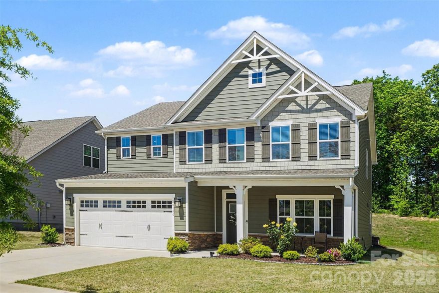 This spacious, beautifully designed two-story home features 5 bedrooms and 4 full bathrooms, with ample upgrades throughout. Located in the sought-after Holcomb Woods neighborhood, it offers the perfect blend of comfort, style, and convenience in a prime setting. Featuring an open floor plan with an inviting living area perfectly designed for entertaining, and a gas fireplace that creates a natural focal point of the open space. The bright and open living area flows seamlessly into the chef’s kitchen, complete with quartz countertops, a large island, stainless steel appliances, and a gas range. The main level includes a guest bedroom with a full bath, perfect for visitors or multi-generational living. A private office on the main floor with French Doors is ideal for conference calls or relaxing with a good book. Upstairs, you’ll find a loft area along with additional bedrooms, including the luxurious primary suite featuring an en suite bath and a spacious walk-in closet. Enjoy outdoor living with a welcoming front porch and a stone-paved backyard patio with a built-in stone seating wall, also featuring a beautiful gazebo—perfect for relaxing or hosting gatherings. A 2-car garage adds convenience and ample storage. Community amenities include a pool, playground, and cabana, offering a lifestyle of comfort and recreation. Easy access to I-485, minutes from shopping and dining.
This home truly has it all—space, functionality, and an unbeatable location!