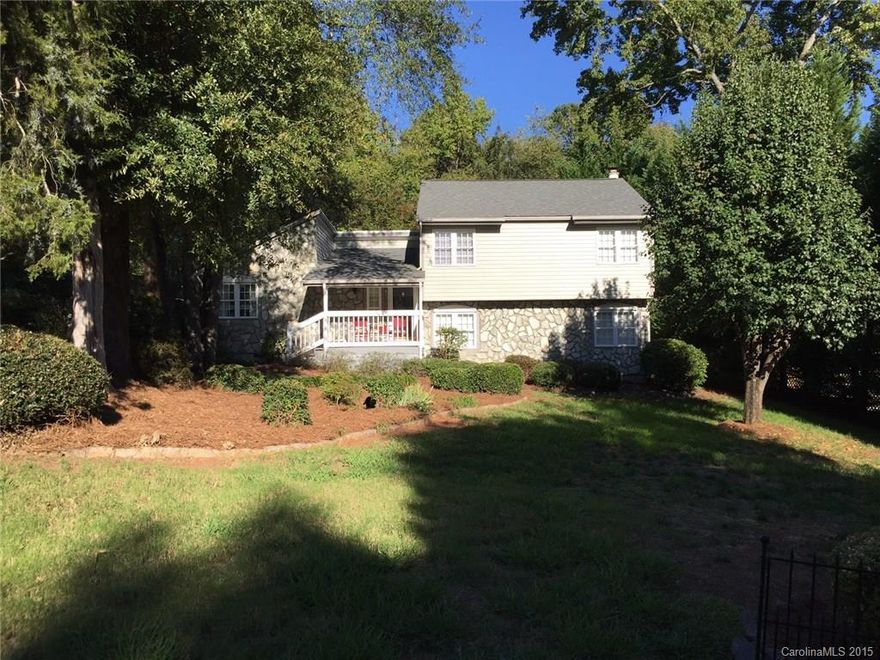 Classic Tega Cay tri-level, stone/vinyl charmer on quiet street across from lake. Great Room, formal dining, kitchen w/newer stove and dishwasher. 4 bedrooms. Lower level has bedroom, den with fireplace and room for kitchenette. Possible secondary living. 2012 Roof. 2013 Siding and windows. Patio, storage room and 2 entertaining decks. Large lot. Walk or bike to Lake Wylie waterfront park. Enjoy fabulous Tega Cay lifestyle.