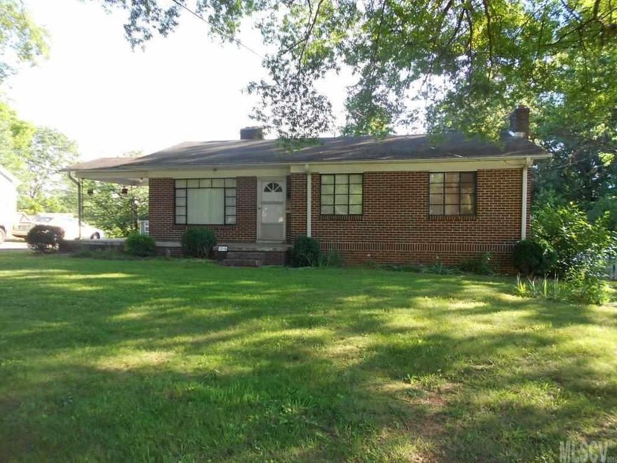 Two bedroom, one bath home, hardwoods under carpet in bedroom & living room, kitchen with eat-in dining area, full unfinished basement, carport area in back with deep backyard or garden area. Natural gas furnace with A/C, 2 fireplaces (1 in basement), leaf guard gutters, gas water heater & more!