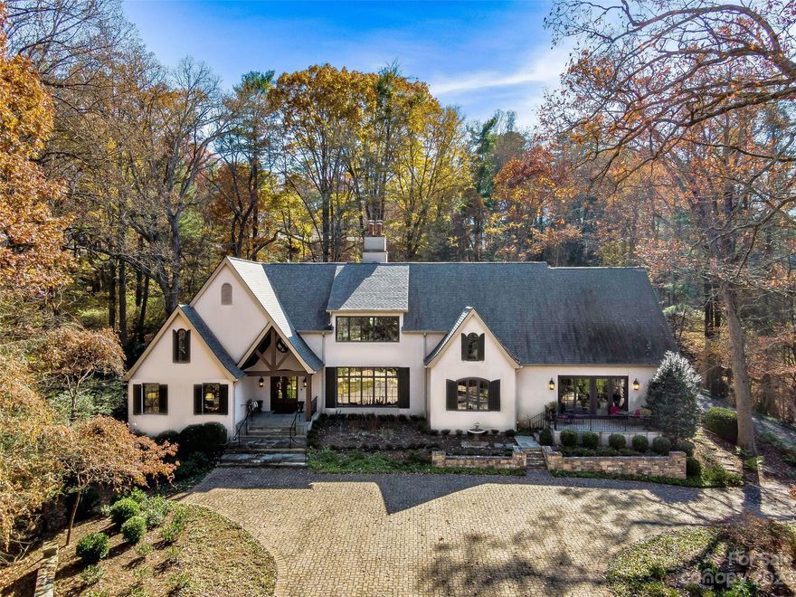 Gorgeous views over the golf course can be yours from this totally renovated home ( circa 2017.)
Superb, private 2.2 acre site within walking distance of the membership Country Club and Carolina
Day School. Great attention to quality and detail were the hallmarks of the renovations and
additions to this home making it a very rare opportunity to live in this historic community without
taking on a major project. Custom wall treatments and bookshelves channel the character of older
homes while the new kitchen, baths, guest quarters, and additional garage create amenities for
today's living. A floor plan that offers the flexibility of an additional main floor bedroom and
privacy for secondary ensuite bedrooms with their own gathering area serve many lifestyles. The guest 
suite with a full bath and kitchenette is located over the detached garage ideal for staff as well.  The grounds 
with lovely landscape and hardscape include a swim against the current pool.