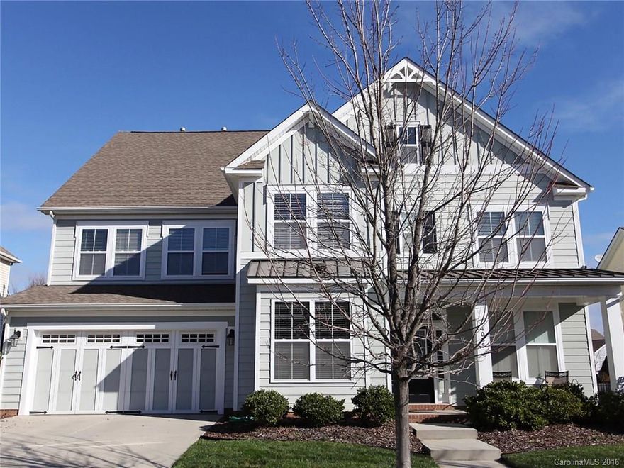 Incredible Curb Appeal with Beautiful Landscaping! Fabulously flowing open floor plan! Gourmet Kitchen boasts SS appliances, double wall oven & butler's pantry! Great Room with gas log fireplace and built-ins. Elegant Master on main. Energy efficient tankless Hot Water Heater. Large walk in closets & additional storage under stairs. So many UPGRADES, the full list is online. Versatile Guest or Teen 3rd floor Bed/bonus with full bath! Enjoy the amenity rich neighborhood and Fort Mill schools!