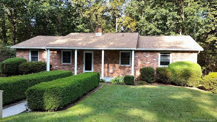 Lovely Brick & frame 3 Bedroom 3 full bath home in popular Whispering Hills. Convenient to Hendersonville via Howard Gap Rd. or Hwy. 25, plus Park Ridge Hospital area and Fletcher via Howard Gap Rd. Nice kitchen updates, large living room with wood burning fireplace, replacement windows throughout, wood laminate floor in dining area, carpet & vinyl in other rooms. Large basement family room & hobby area plus full bath. 2 car garage with workshop area. Lovely landscaped yard front & back.