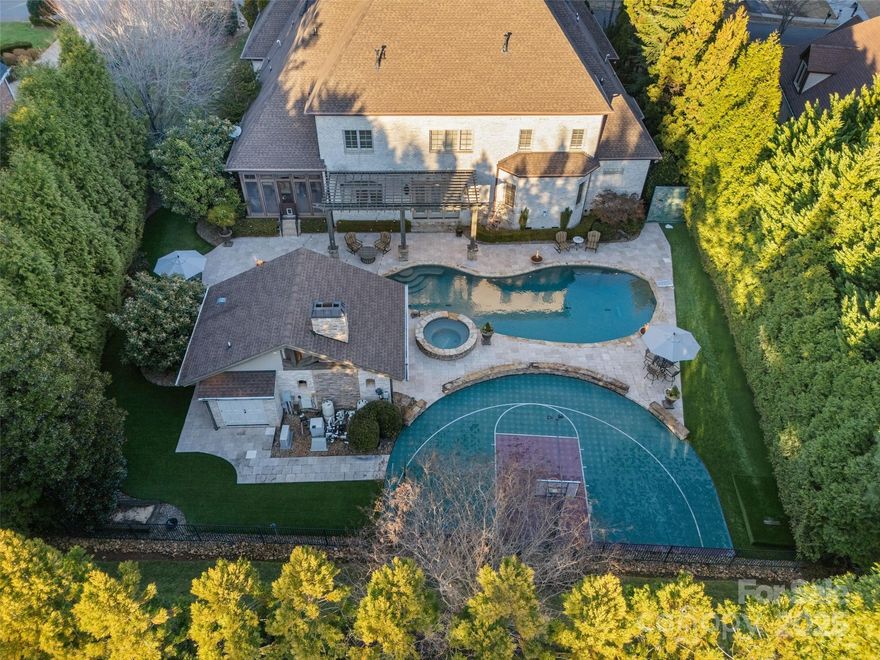 Welcome to 3042 Kings Manor, where luxury finishes and exceptional craftsmanship offer a lifestyle fit for royalty. This custom-built, one owner estate home, is nestled in Highgate at Weddington. Spanning almost 7,400 sq ft Featuring 6 spacious en-suite bedrooms, including a primary suite & guest on the main level. Upstairs you have 4 bedrooms, 4 baths, wine room, endless walk-in storage, plus 3 bonus rooms offering a movie room, game room & playroom. Step outside into your very own resort-style backyard oasis. The Olympic-sized pool takes center stage, complemented by a pool house featuring an outdoor kitchen, full bathroom, and fireplace. The sport court is perfect for basketball or pickleball, and the maintenance-free turf lawn ensures a lush, private retreat within the fully landscaped & fenced property. Additional features include 4-car garage, year-round sunroom, exercise room, and so much more. Don't miss this rare opportunity to own a one-of-a-kind home fit for a king!