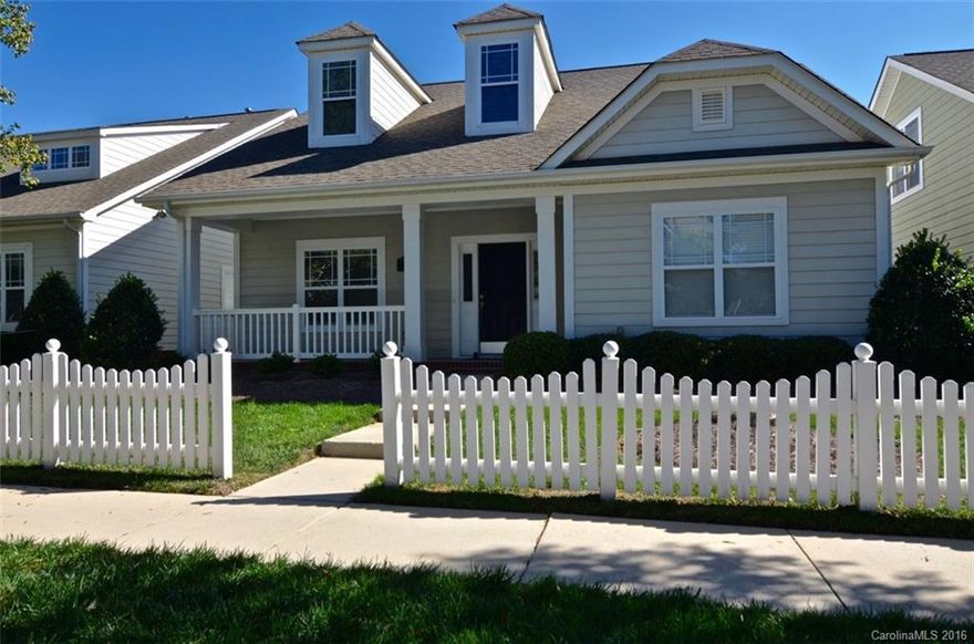 Charming bungalow style home w /rocking chair front porch, one level living, yard maintenance included. Interior freshly painted, new carpet in MBR, new vinyl in laundry room, new blinds throughout, new garage door, sunroom with tile floor, prefinished hdwds, corian countertops, ss appliances. Large garden tub with jazcuzzi jets