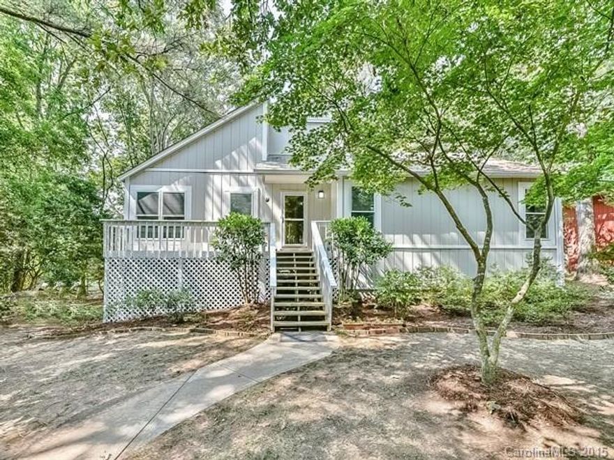 Backyard opens to the Tega Cay Golf Course; this home has been freshly painted and carpeted. Updated kitchen has work island and granite counters. Sunroom is off the kitchen and has beautiful golf course views. Lower level has a rec room with fireplace, slider to back yard patio and a spacious bedroom and bath. Heated basement area is a huge heated storage room, unfinished(approx. 596 Sq. Ft.).