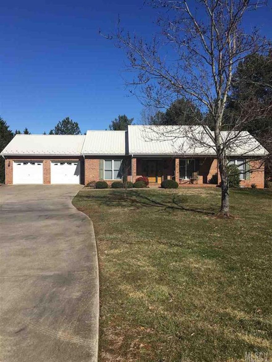 THIS ONE WON'T LAST LONG!! HIGHLY SOUGHT AFTER GRACE CHAPEL AREA.  NO CITY TAXES!!!  Amazing 3bd 2 ba custom built maintenance free full brick home located in a quiet family friendly lakefront community. Home is on a cul-de-sac RD for leisurely  walks and views of the lake. Rocking chair front porch. Back yard is fenced in great for pets. There is an outside bldg for all your storage needs.     This home offers an open floor plan great for family fun and entertainment and a seasonal sunroom. Hardwood floors throughout main living area and master BR. most doorways are oversized for easy accessibility. Home has a split bedroom floor plan. All bedrooms are large with walk in closets. Master BR has tray ceiling. Kitchen with upgraded appliances,garbage disposal,lots of cabinets and new Corian counter tops. Butlers pantry. Laundry room leading to oversized double garage with pull down attic space. Adjoining lot for SALE!  Home Warranty Offered!!