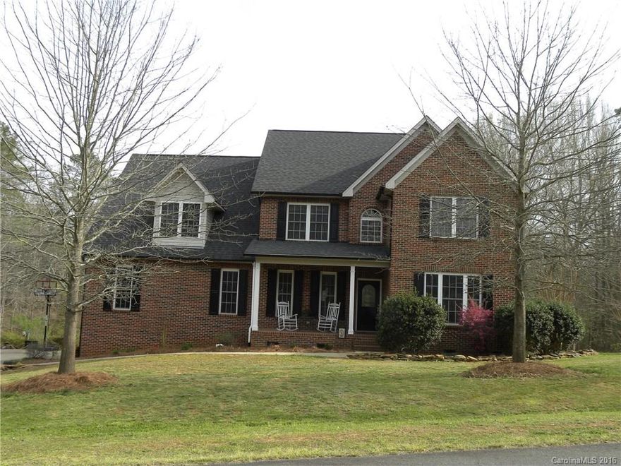 Quiet southern charm!  This full brick home located in sought after estate neighborhood on over one acre overlooking a beautiful pond.  Recent renovations include stainless steel appliances, granite countertops, flooring and more.  Open kitchen with breakfast area overlooking the pond and backyard, handsome fireplace in the great room with formal living and dining rooms.  Master retreat with granite countertops, custom vanity, and jetted tub. Oversized garage with storage. Home warranty in place