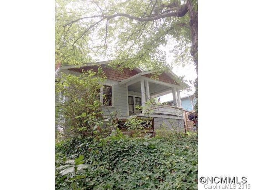 Vingage West Asheville Bungalow. Privately positioned off the street. Sweet front porch for happy hour. Restored windows, natural unpainted trim throughout house, hardwood floors, nicely updated bathroom w Subway tile, fireplace (currently not functional) and lots more. A most excellent West Avl find so Be sure to get your clients in this one.