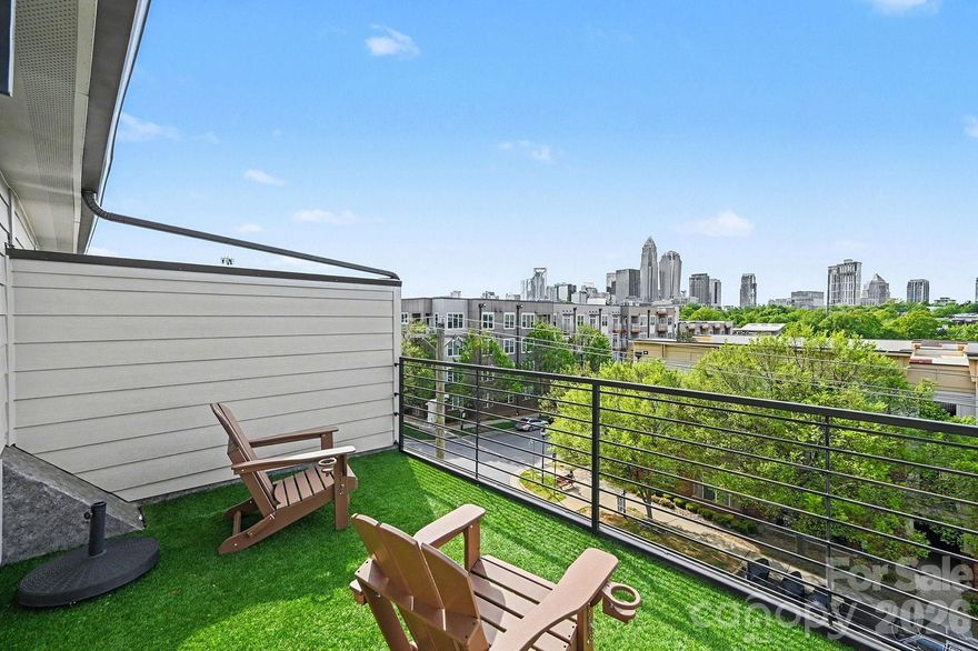 Welcome to elevated city living in the heart of one of Charlotte’s most vibrant neighborhoods. Located just outside of Uptown in highly desirable Plaza Midwood, this stunning three-story full brick townhome offers the perfect combination of modern design, low-maintenance living, and unbeatable access to the city.

This thoughtfully designed home features 3 bedrooms and 3.5 bathrooms, offering both comfort and flexibility for a variety of living arrangements. Each secondary bedroom includes its own private en suite bathroom, making the layout ideal for guests, roommates, or anyone who values privacy and convenience.

The main living level is bright and open, creating a perfect space for both everyday living and entertaining. The kitchen is beautifully appointed with high-end appliances, modern finishes, and ample cabinet and counter space. For added convenience, the refrigerator, washer, and dryer all convey with the home, making it truly move-in ready. Just off the kitchen, you’ll also find a private patio, offering an additional outdoor living space that’s perfect for grilling, relaxing, or enjoying fresh air right off the main entertaining level.

One of the standout features of this property is the incredible private rooftop patio, complete with low-maintenance turf and direct views of the Charlotte skyline. Whether you’re enjoying your morning coffee, hosting friends, or relaxing in the evening while the city lights come on, this rooftop space offers a rare and unforgettable vantage point of the city.

Parking and storage are equally impressive with a tandem two-car garage that offers easier pull-in access compared to many other units in the community, making everyday living more convenient.

Outdoor enthusiasts will love the direct access to the Sugar Creek Greenway, providing miles of scenic trails for walking, running, and biking just steps from your front door. The location also places you minutes from Uptown, NoDa, and Plaza Midwood’s renowned restaurants, breweries, coffee shops, and entertainment, offering the best of Charlotte’s urban lifestyle.

With its durable full brick exterior, multiple outdoor living spaces, modern interior features, skyline views, and prime location, this home offers a rare opportunity to own a stylish and low-maintenance property in one of Charlotte’s most sought-after areas.