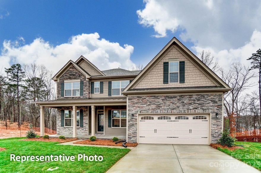 This 5-bedroom/4-bath Charleston plan has it all! The main level features a guest suite with full bath, a spacious family room with fireplace, a designer kitchen with butler's pantry, a dining room with tray ceiling, and a study with French doors. The second floor has 4 bedrooms including the primary suite, as well as a large bonus room. The kitchen features white cabinets with a gray island, quartz counters, a tile backsplash, and stainless appliances including a gas cooktop, wall oven, and wine cooler in the butler's pantry. Enjoy the outdoors on the spacious rear screened porch. Additional upgrades include EVP flooring throughout the main living spaces, quartz counters in all bathrooms, composite stairs with metal balusters, and a large drop zone. Community amenities include a pool, cabana, & playground. Onsite New Home Specialist can provide guidance regarding estimated completion dates, however, any dates provided are subject to change.