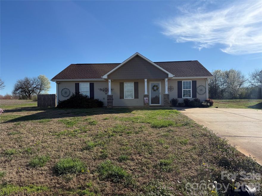 3 bedroom 2 bath bungalow style home with low maintenance and in country setting.  Home is in quiet subdivision outside of Cherryville.  Great first time starter or first time homebuyers!!! Fenced in yard.  A must see!