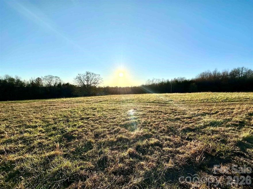 52.6 beautiful acres north of Lake Bowen, just off Hwy 9 in Spartanburg County, approximately 12-14 miles to the popular Tryon Equestrian Center. This attractive parcel could be transformed into an exquisite equestrian farm or ranch, offering pasture, trees, and a natural water source. A small home is on land that needs finishing and remodel. The rolling acreage could also be potentially subdivided for development offering plenty of road frontage for a new community. Additionally, the property could be used for a hunting club with bountiful deer, turkey, and other wildlife. Sections of the property are cleared while other sections have hardwoods and pine. There is a beautiful stream that forms the left property boarder. There are also many possible building sites on the 52.6 acres. The front field offers level building sites with beautiful mountain views. Lake Bowen Anchor Park is only 6.4 miles away, while Boiling Springs is 11.7 miles away.