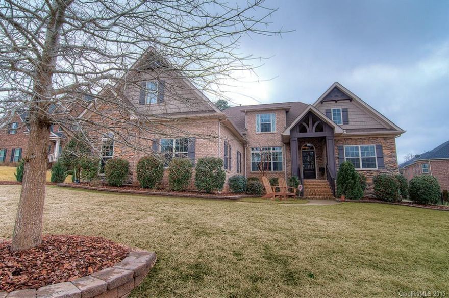 Custom built home by The Williams Co. Exquisite details, open floor plan & loaded w/custom details. Nice mill work & hardwoods throughout main. Spectacular kitchen w/granite, SS appl's, custom cabinets & bksplash. GR & Master have cauffered ceilings. Fireplace & custom bar in GR. Master & Guest rm on main, plus 2 beds up. Huge bonus & additional play/craft room at end of bonus. 3 car garage w/epoxy floor. Fenced backyard and play area.