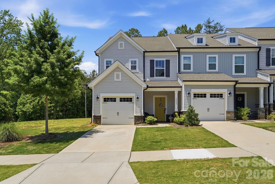 Welcome Home! End-unit living with the privacy you didn't think was possible in a townhome. 12005 Basking Drive offers a thoughtfully designed layout in The Landings at Catawba River, with a tree-lined private backyard that makes this one a standout.

The open-concept main level is bright and welcoming, featuring LVP flooring throughout, quartz countertops, and stainless steel appliances, everything move-in ready and done right. The kitchen flows naturally into the living area, making everyday living and entertaining feel effortless.

Upstairs, the primary suite is a true retreat with a walk-in closet and oversized shower. Two additional bedrooms, a second full bath, and an upper-level laundry round out the second floor. A one-car garage and a private backyard backing to trees complete the package.

Minutes to the U.S. National Whitewater Center, Mountain Island Lake, and I-485 for an easy commute to Uptown Charlotte and beyond.