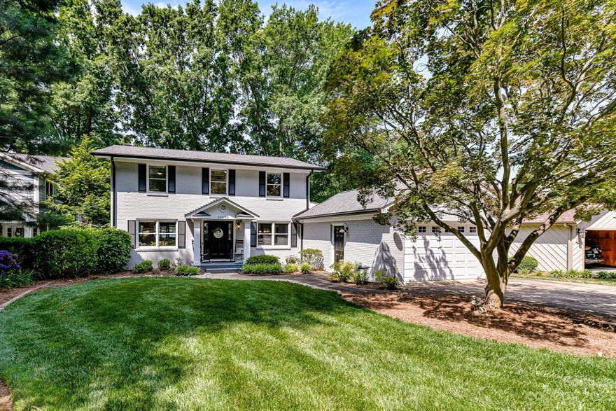 Spectacular waterfront home with priceless sunset views!!  This 4 bedroom, 3 1/2 bath full brick home was taken down to the studs on interior!  First floor Primary bedroom/bath, laundry room, drop zone, and deck were added! Home features 2 spacious primary bedrooms, both with coveted water views! 2 gorgeous electric fireplaces inside and gas propane fireplace at deck area.  New Electrical, new plumbing, new appliances (5 yrs), new fixtures, toilets..down to the studs!  New gutters, new roof, 3 new HVAC systems new tankless water heater, new vinyl and aluminum wrapped soffit and facia for no maintenance!  Huge sunroom overlooks backyard and lake.  Oversized 1 car garage has plenty of additional storage. Lake storage accessible from right side yard. Large flat backyard with endless possibilities!  No impervious restrictions! Floating dock with newer Hydrohoist lift and Jet ski dock. Home was recently connected to city sewer. New rear cobblestone patio being installed!! Lots to Love!!