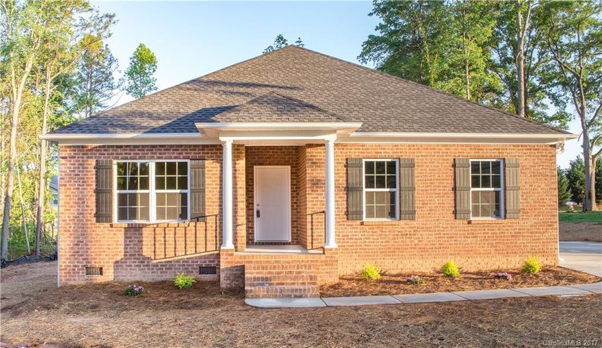 Beautiful, all brick new construction!!  One story, open concept floor plan.  Granite throughout kitchen and baths.  Stainless steel appliances. Hardwoods in main living areas, tile in baths, and carpet in bedrooms.  Split bedroom plan with huge master closet and bath. Garden tub and custom tile shower. Home has custom white faux wood blinds throughout. This home has so much to offer!  Home sits on half acre with No HOA!! Close to shopping and restaurants too!