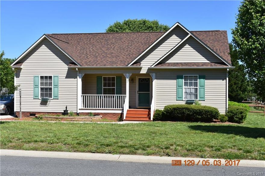 Cozy ranch home with front porch, screened porch, deck, and over 800 sq. ft. of concrete patio ($5000+ value). Double width driveway. 14x9.5 wired workshop and additional covered storage area. Fenced back yard with mature trees for shade and privacy in back. Cathedral ceiling in family room, trey ceiling in master bedroom.  Split bedroom floor plan.