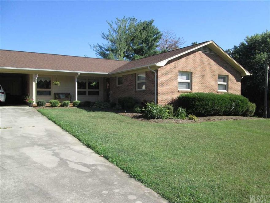 This ranch style home is in excellent condition.  Features include a large eat-in kitchen, laundry & office, beautiful flooring throughout and beautiful views.  It also has a partially finished walk-out basement with a fireplace, a kitchen and a full bath.  Close to interstate.  This house is move-in ready!