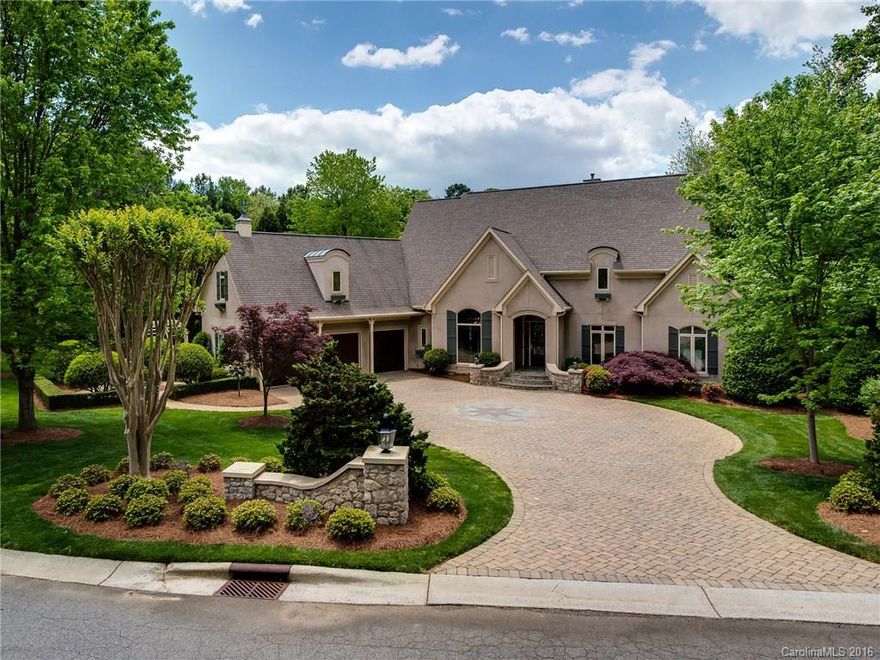 No expense spared or detail overlooked. A truly special & sophisticated home for the discerning buyer.  Of all the beautiful homes in The Peninsula on Lake Norman, this waterfront home nestled on a cul-de-sac stands out as one of the finest. With intricate embellishments & timeless finishes, the property has been impeccably cared for by its original owners. Enchanting pergola crowns the path to the gazebo & boat dock, taking full advantage of the sunsets on appropriately named “Sunset Cove”.