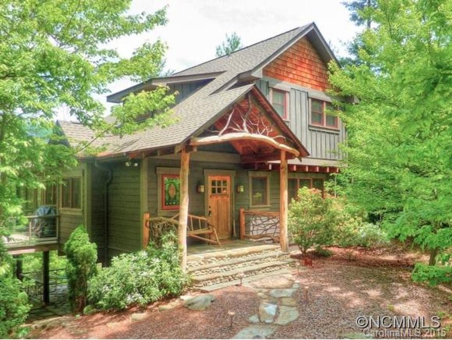 Wonderfully distinctive home with enviable lake and mountain views. Located only minutes away from Lake Lure beach, this 3 BR/3.5 Ba home features a large master suite on the main level, master bath with dual vanities and jetted tub, hardwood and slate flooring, SS appliances, butcherblock counter tops, tongue & groove paneling, exposed beam ceiling, gas log stove and multiple decks/porches.